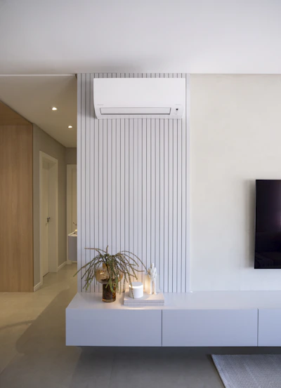 Modern living room with air conditioner and decor