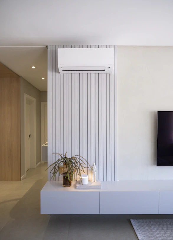 Modern living room with air conditioner and decor