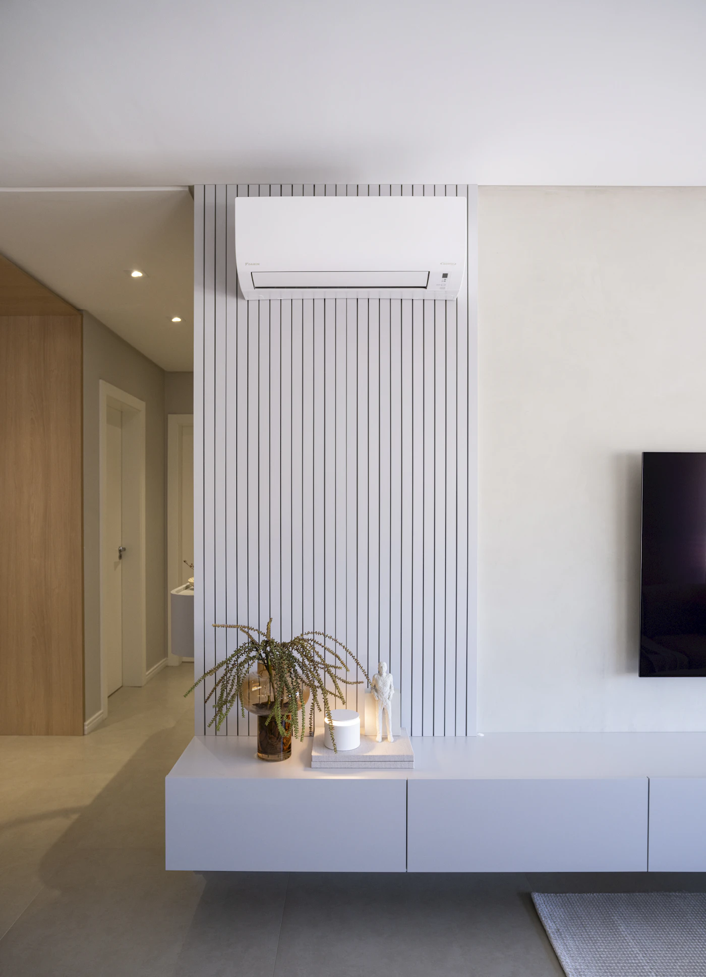 Modern Davao home living room with wall-mounted Daikin air conditioner — the result of a well-maintained system