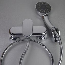 Chrome bathtub faucet with handheld showerhead