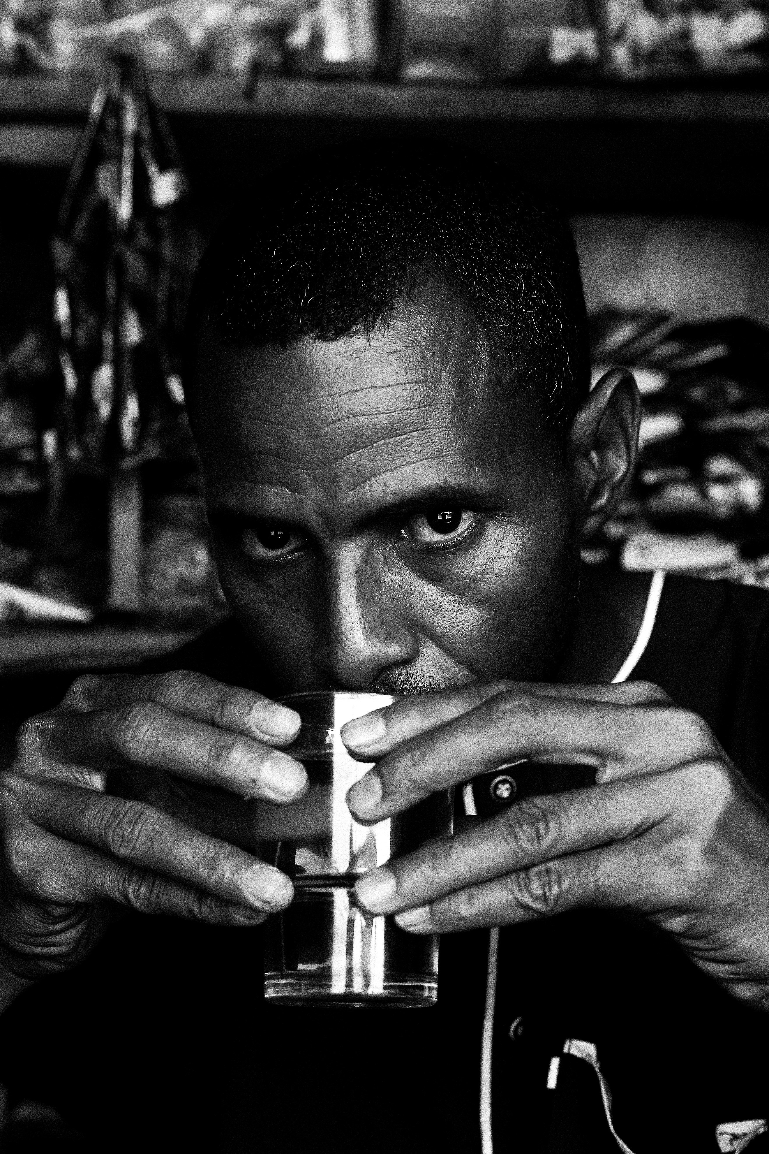 Man drinking from a glass