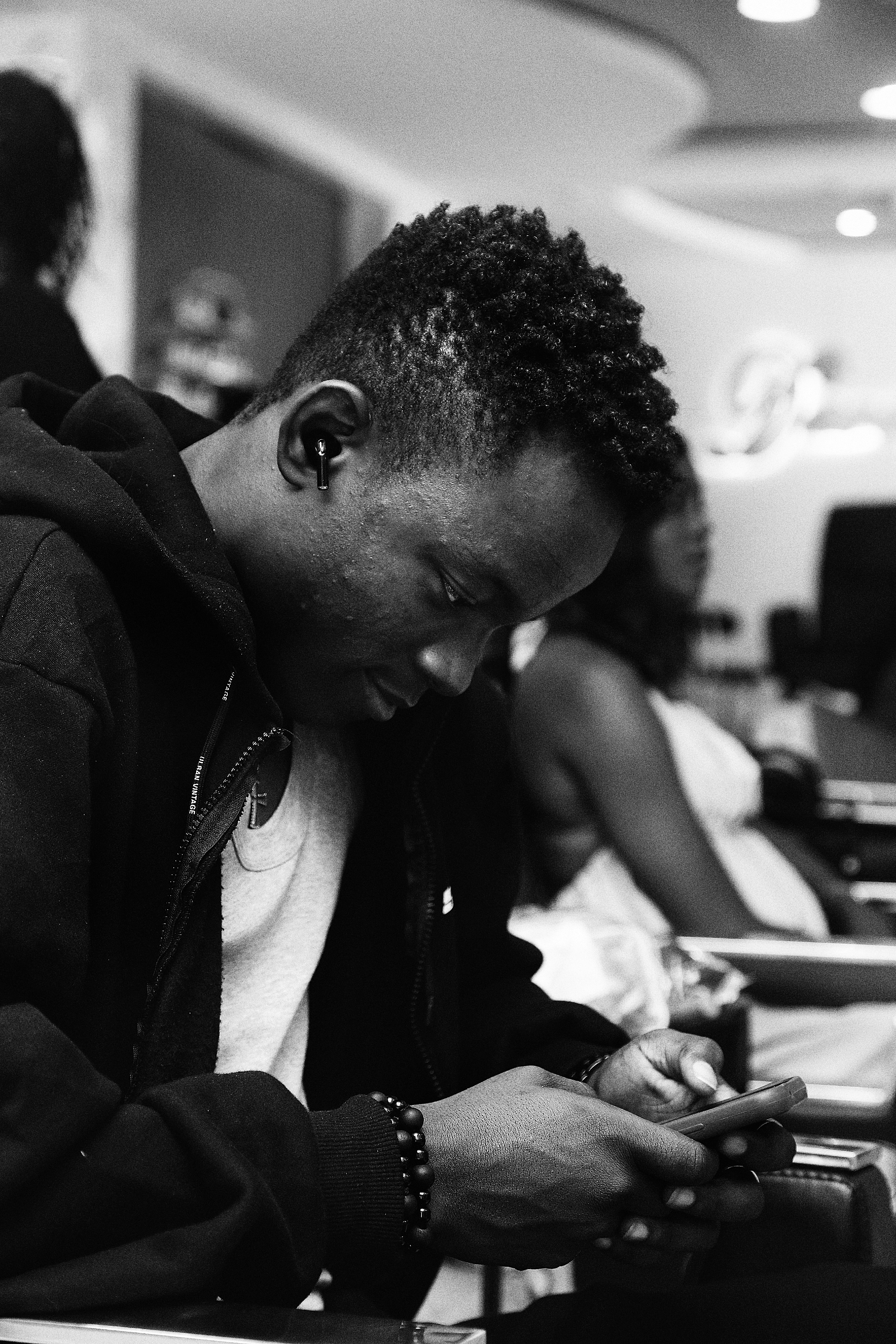 Man looking down at his phone