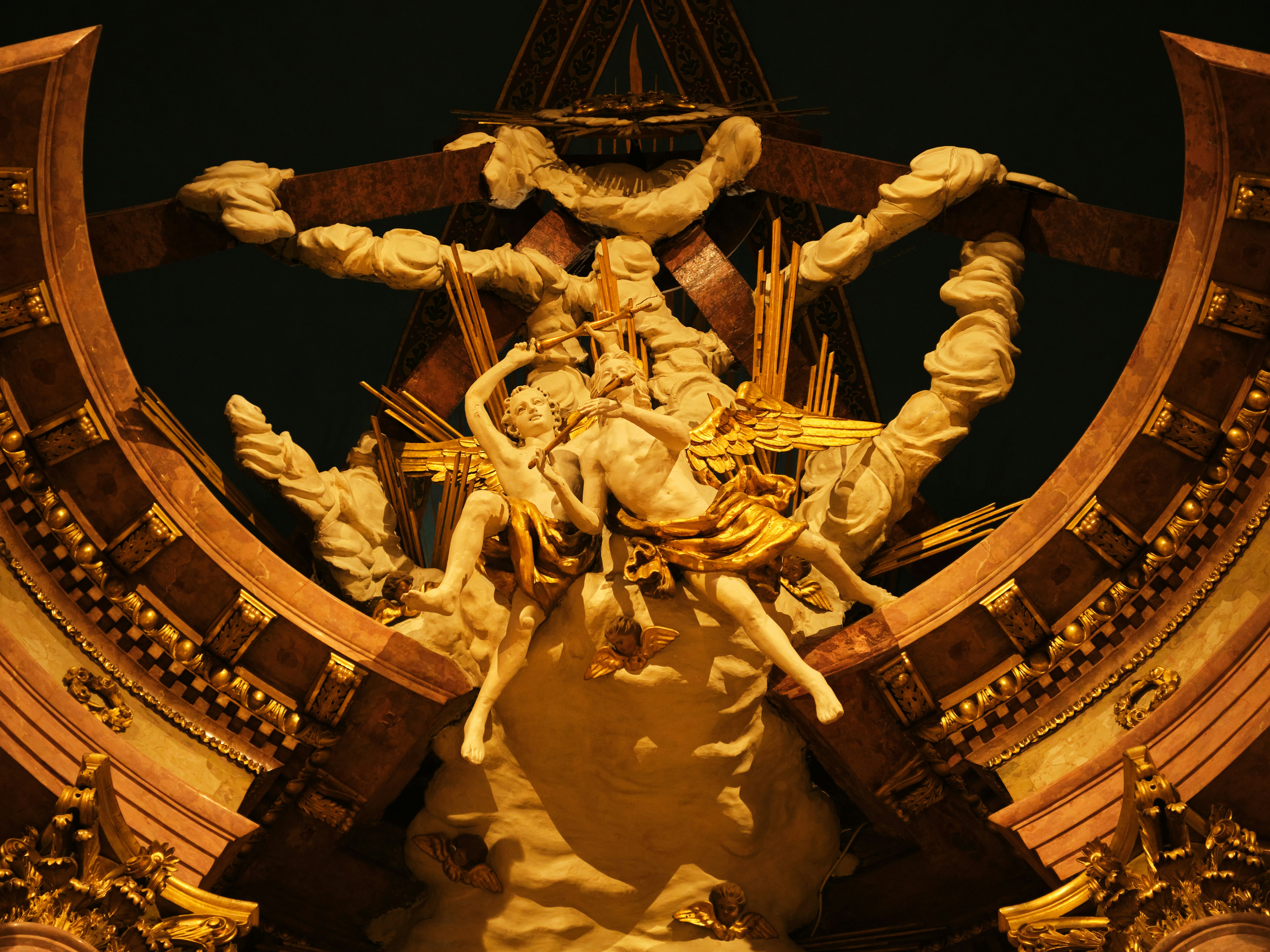 Ornate religious sculpture with gold accents