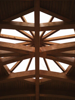 Wooden ceiling beams forming a geometric pattern