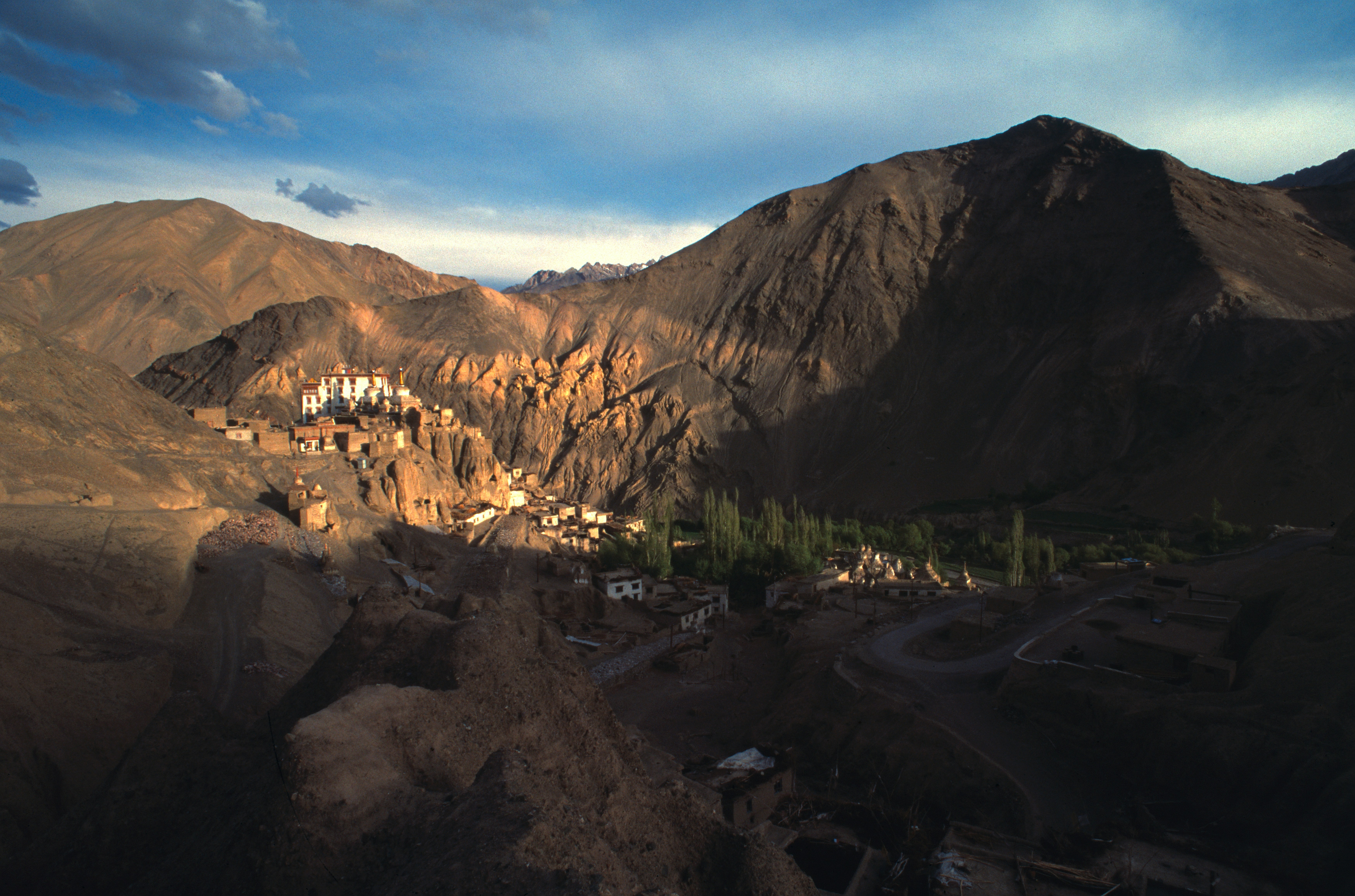 Mountain village nestled in a sunlit canyon.