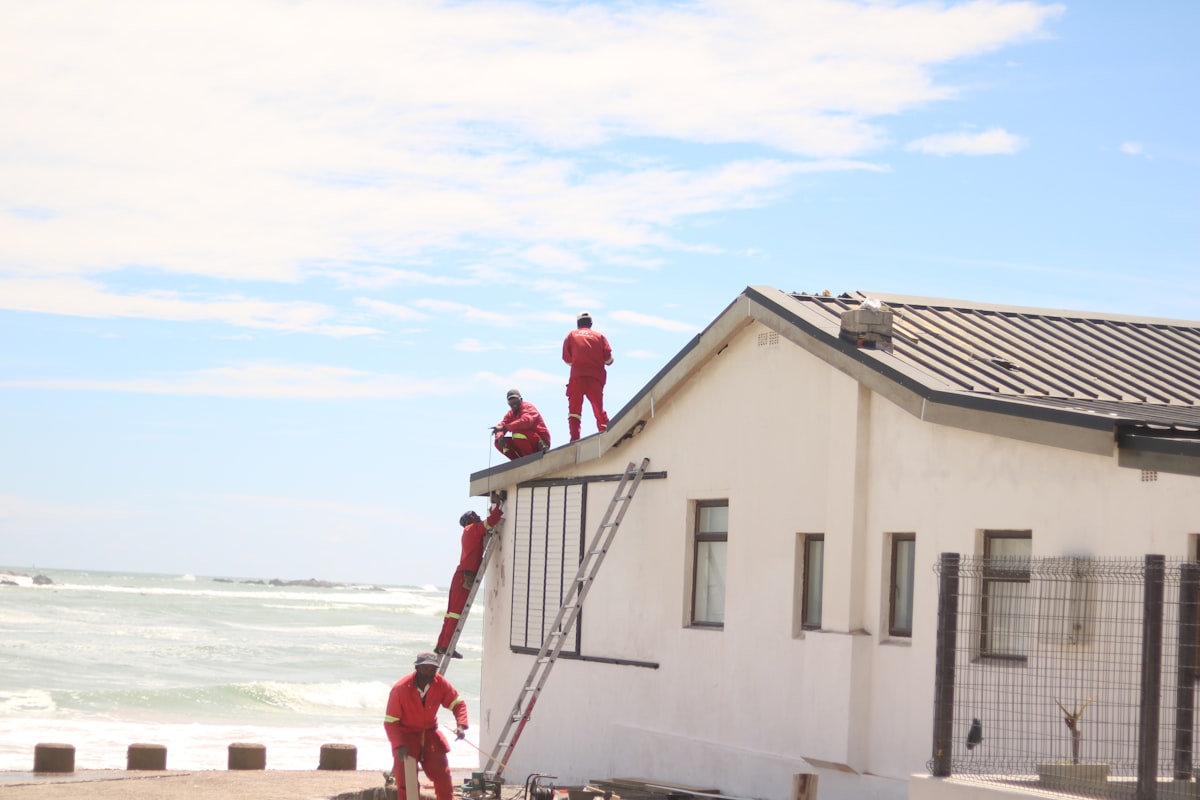 Home exterior being inspected on a clear day