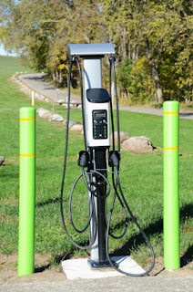 Electric car charging station with two cables