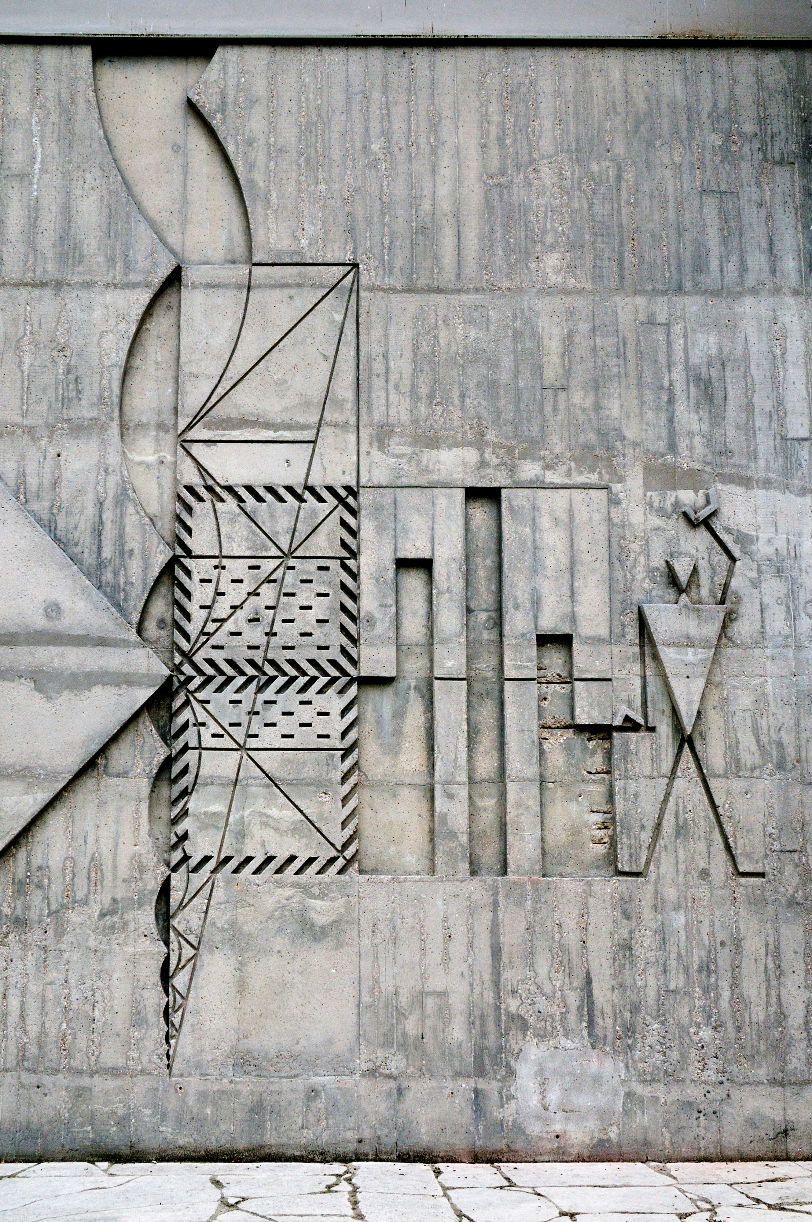Abstract concrete relief with geometric patterns