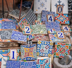Colorful decorative tiles with numbers and patterns.