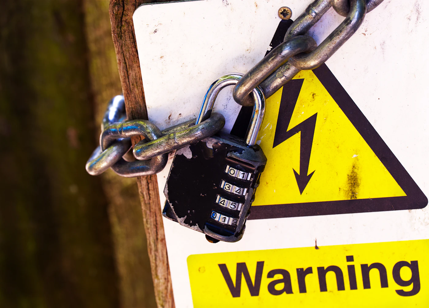 Closed padlock on a metal chain