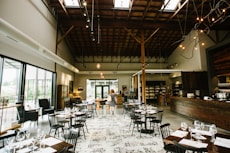 Spacious restaurant interior with tables and chairs