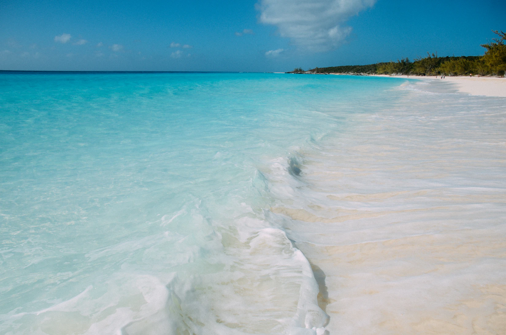 Turquoise lagoon with coral and white sand