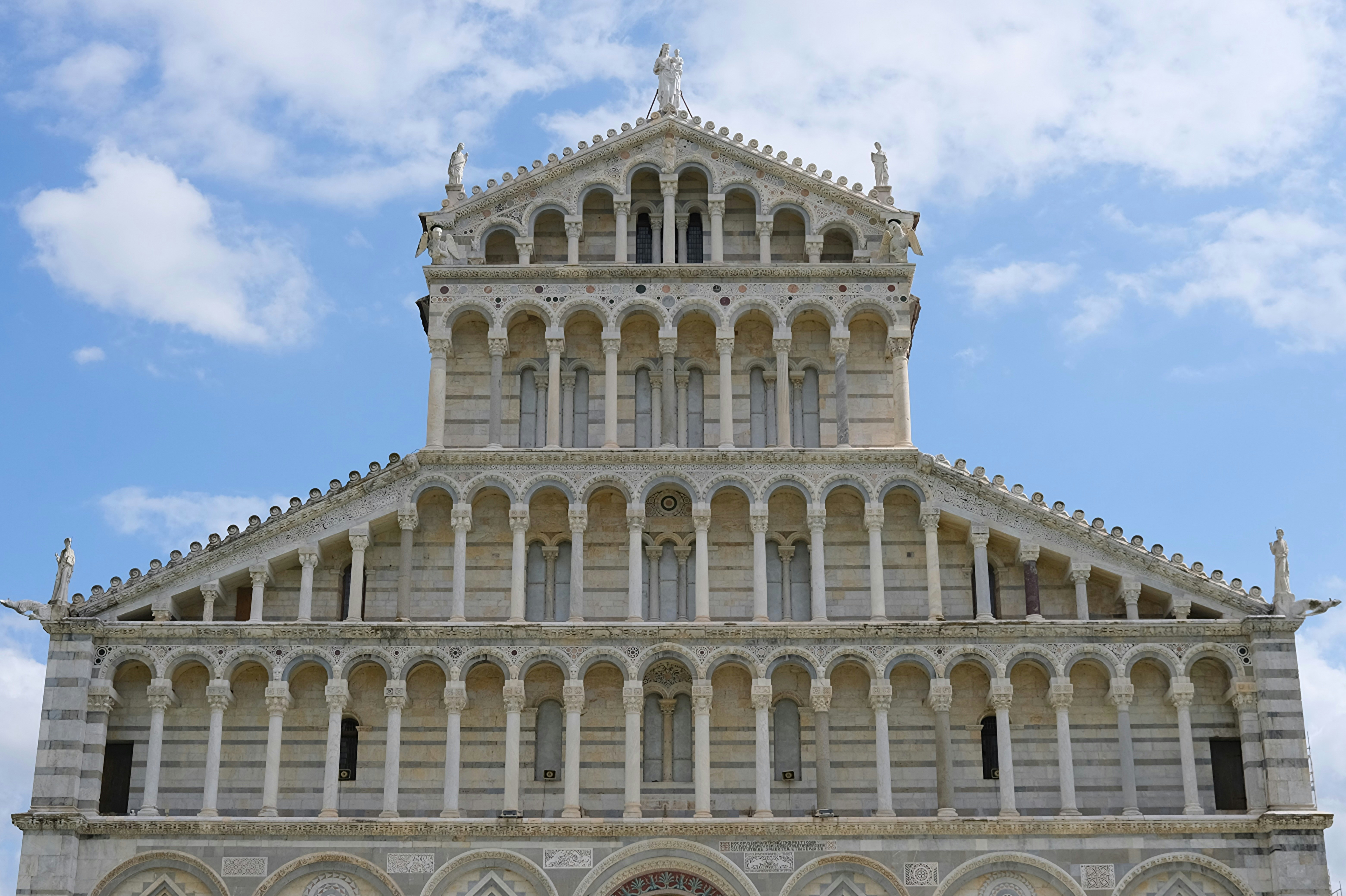 White marble cathedral facade with blue sky