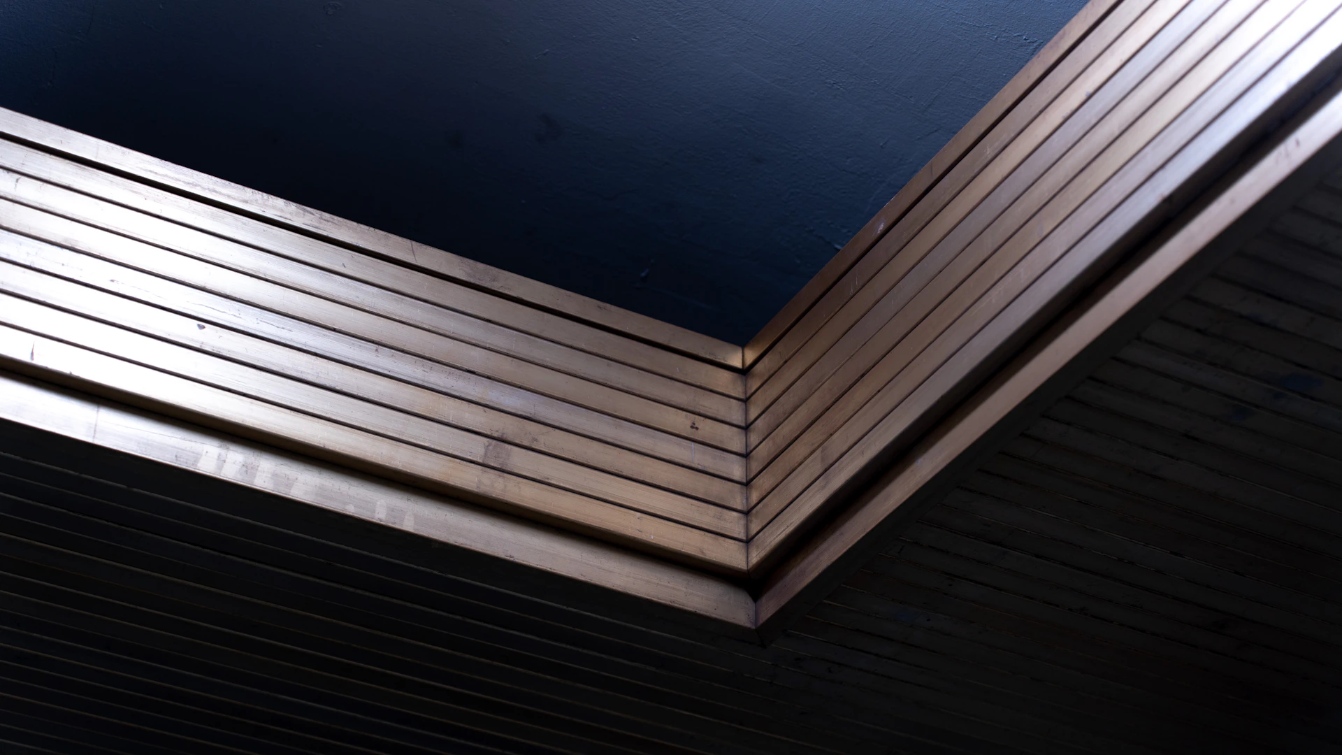 Stack of dark blue and metallic sheets
