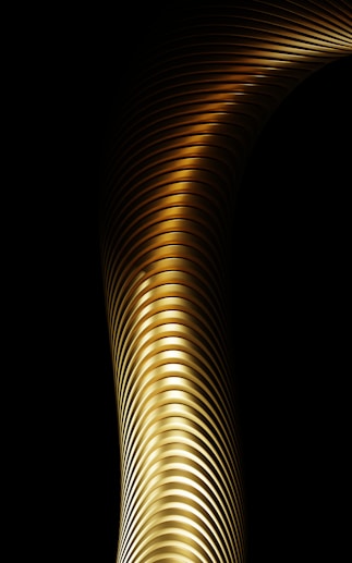 Golden ribbed texture against a black background