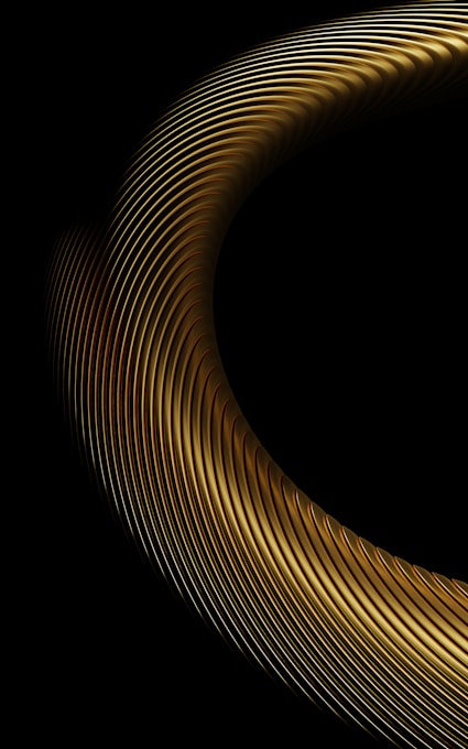 Abstract golden ring with ribbed texture on black background
