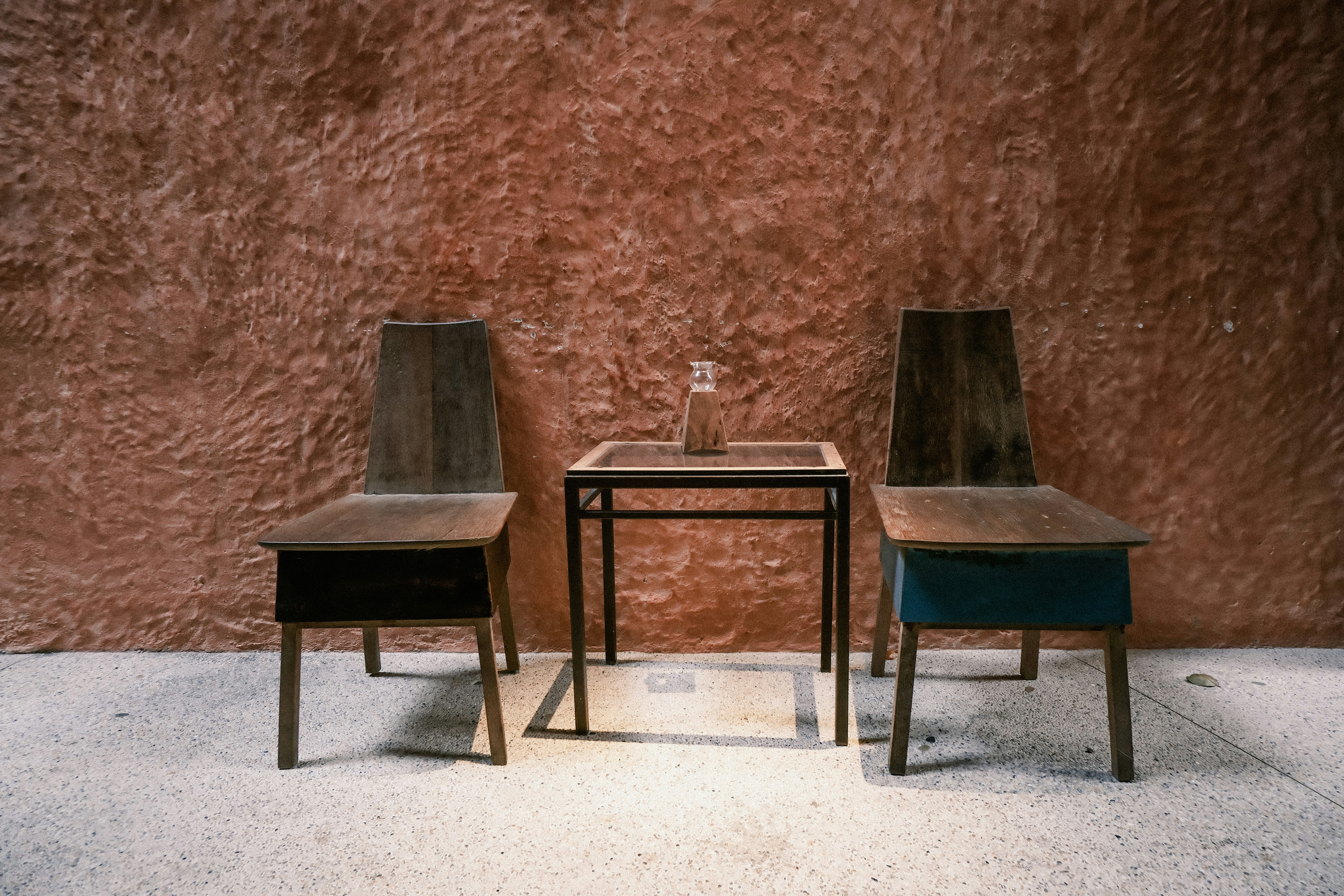 Intimate dining setup with modern chairs