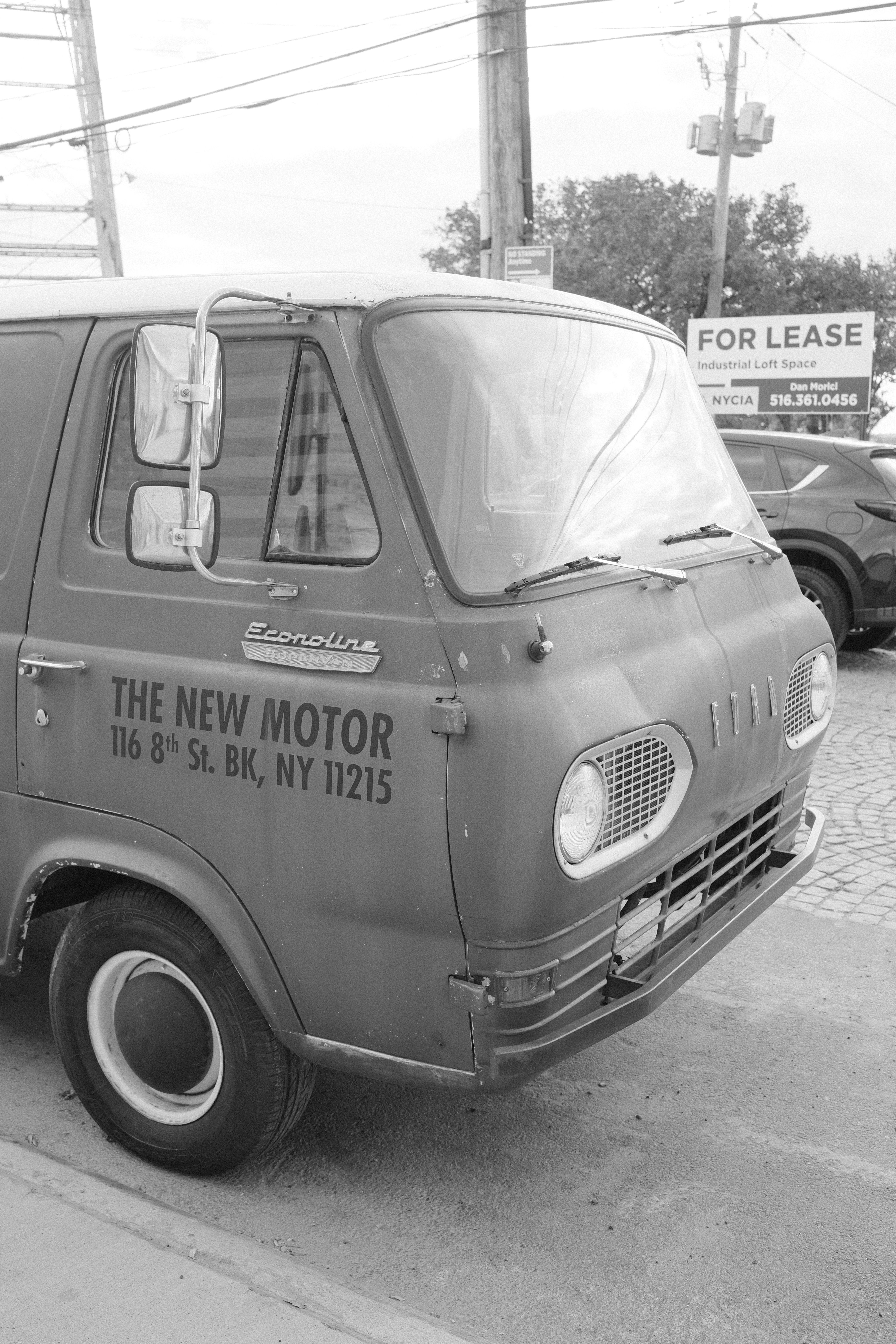 Vintage van with "the new motor" text