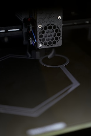 3D printer creating a hexagonal shape