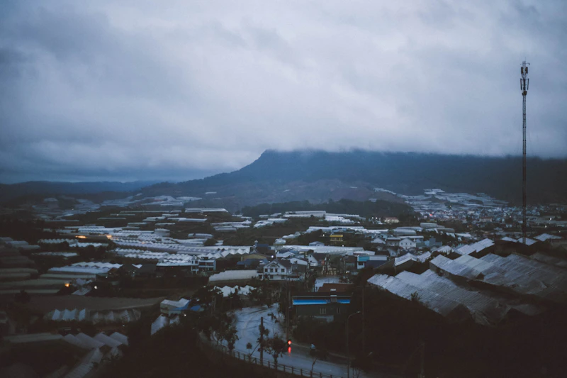 Overcast sky over town and mountains