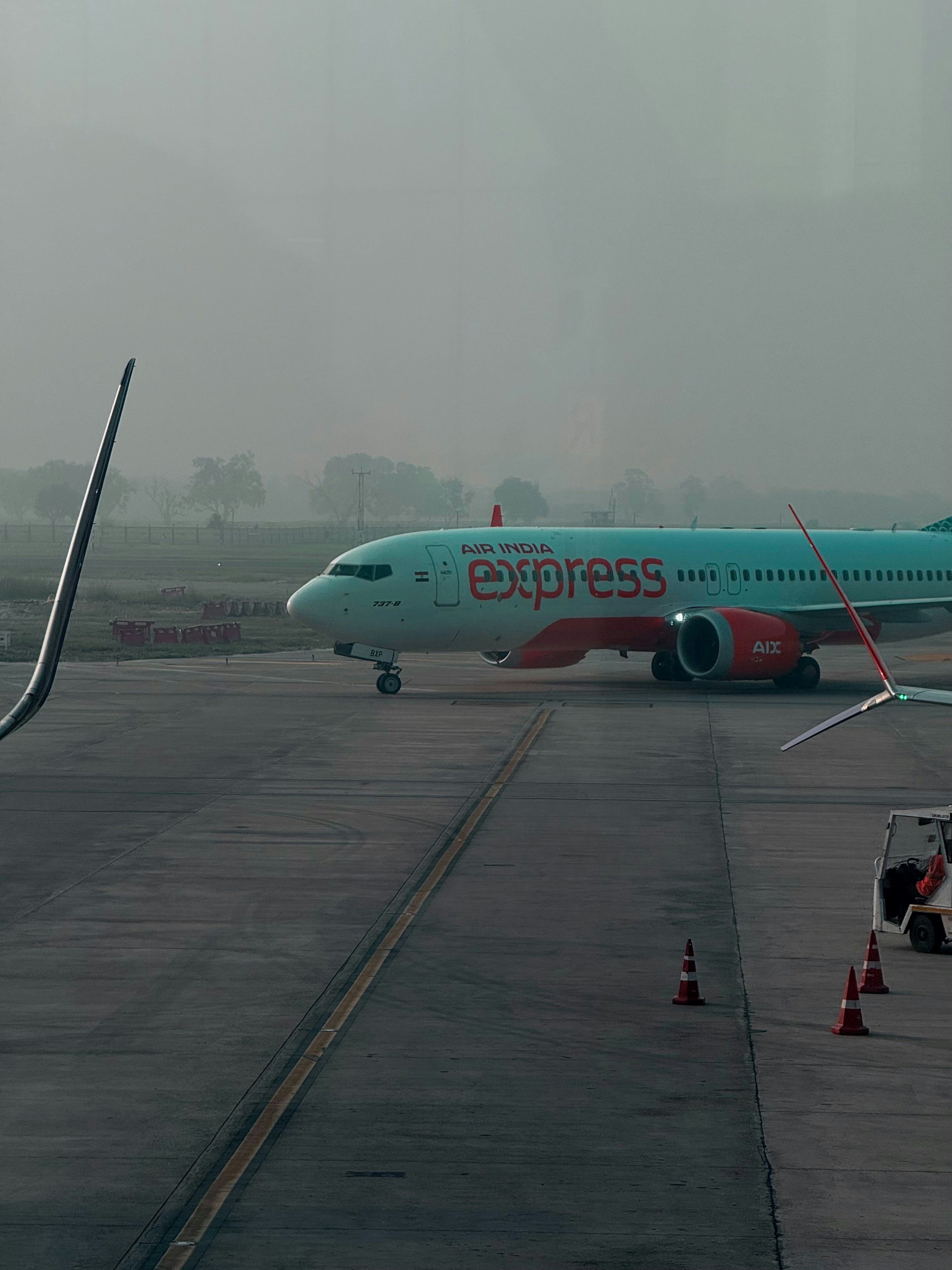 Airplane on the tarmac with 'express' logo.