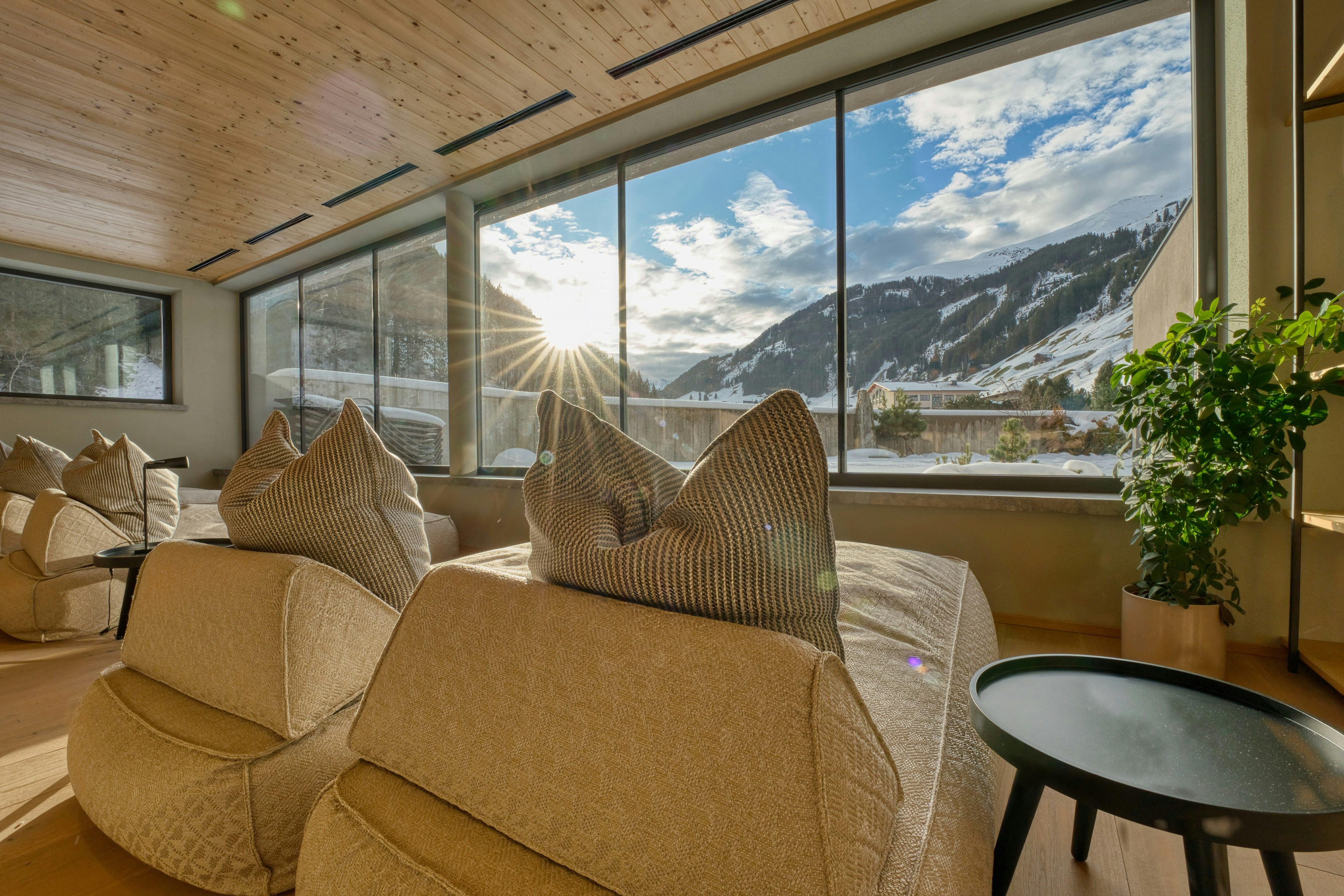 Relaxing lounge area with mountain view at sunrise