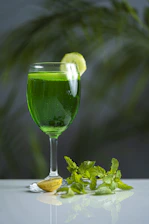 A refreshing green drink with lime and mint