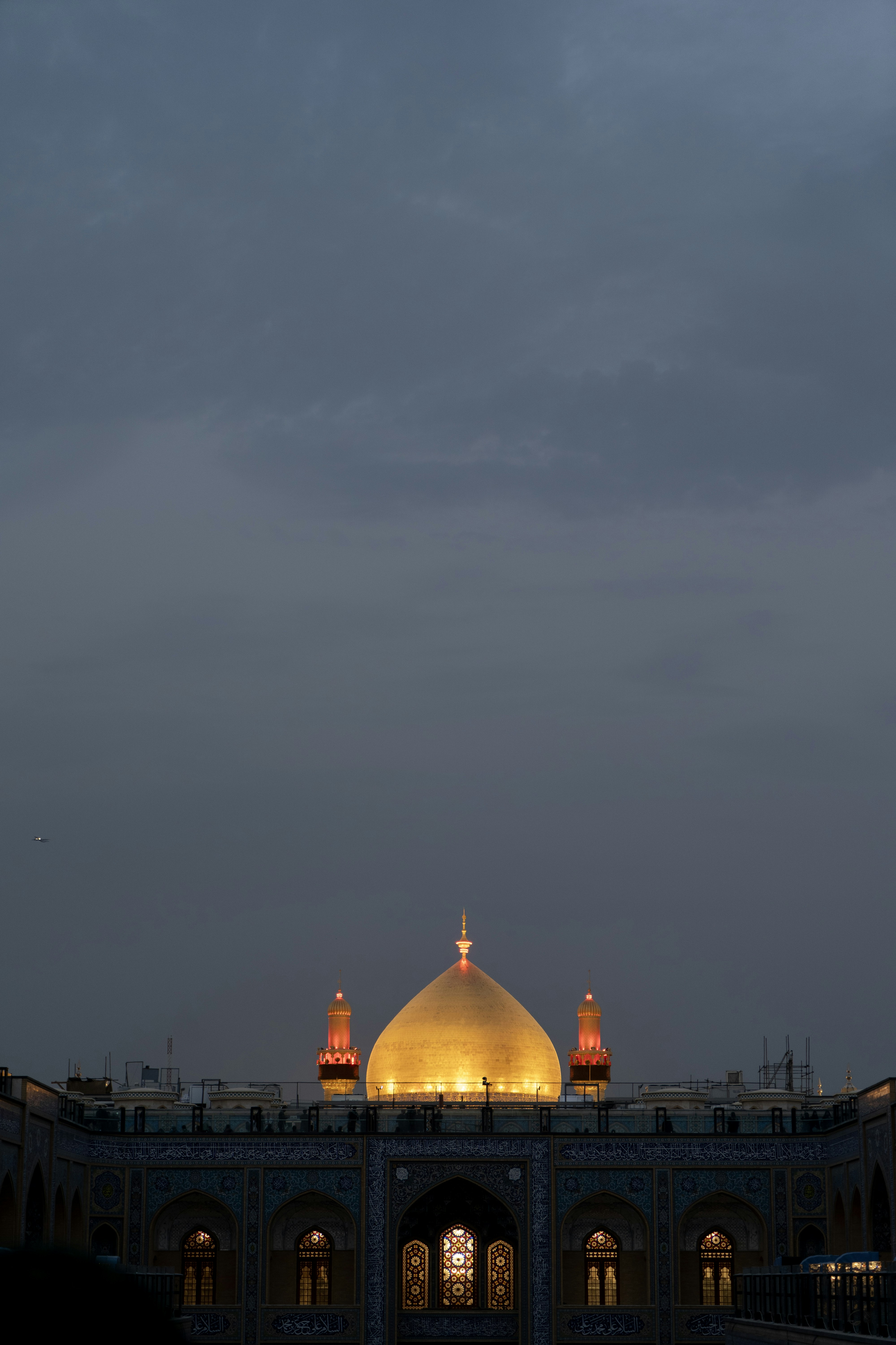 Golden dome of a mosque at dusk