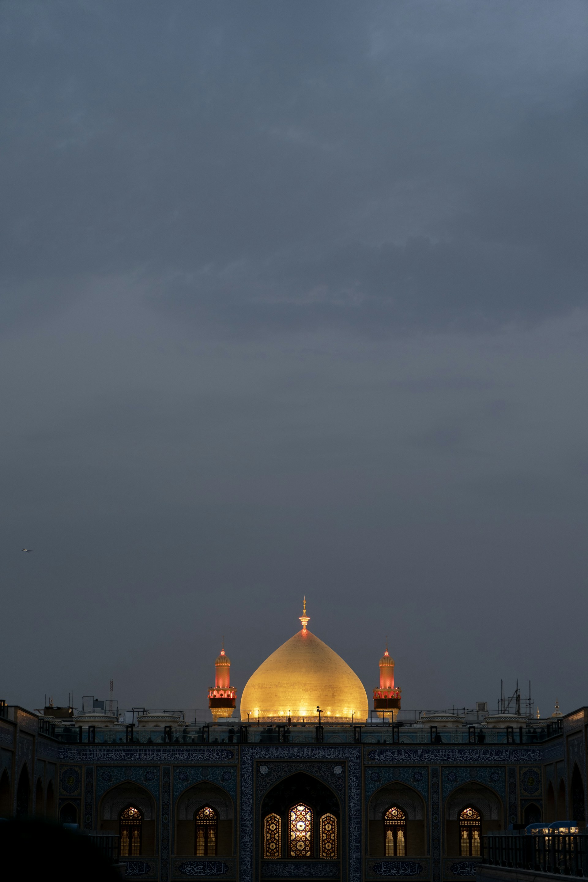 Golden dome of a mosque at dusk