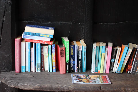 A collection of books on a shelf