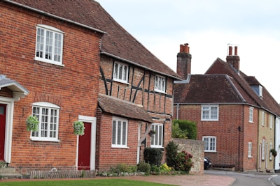 Row of traditional brick houses with timber framing.