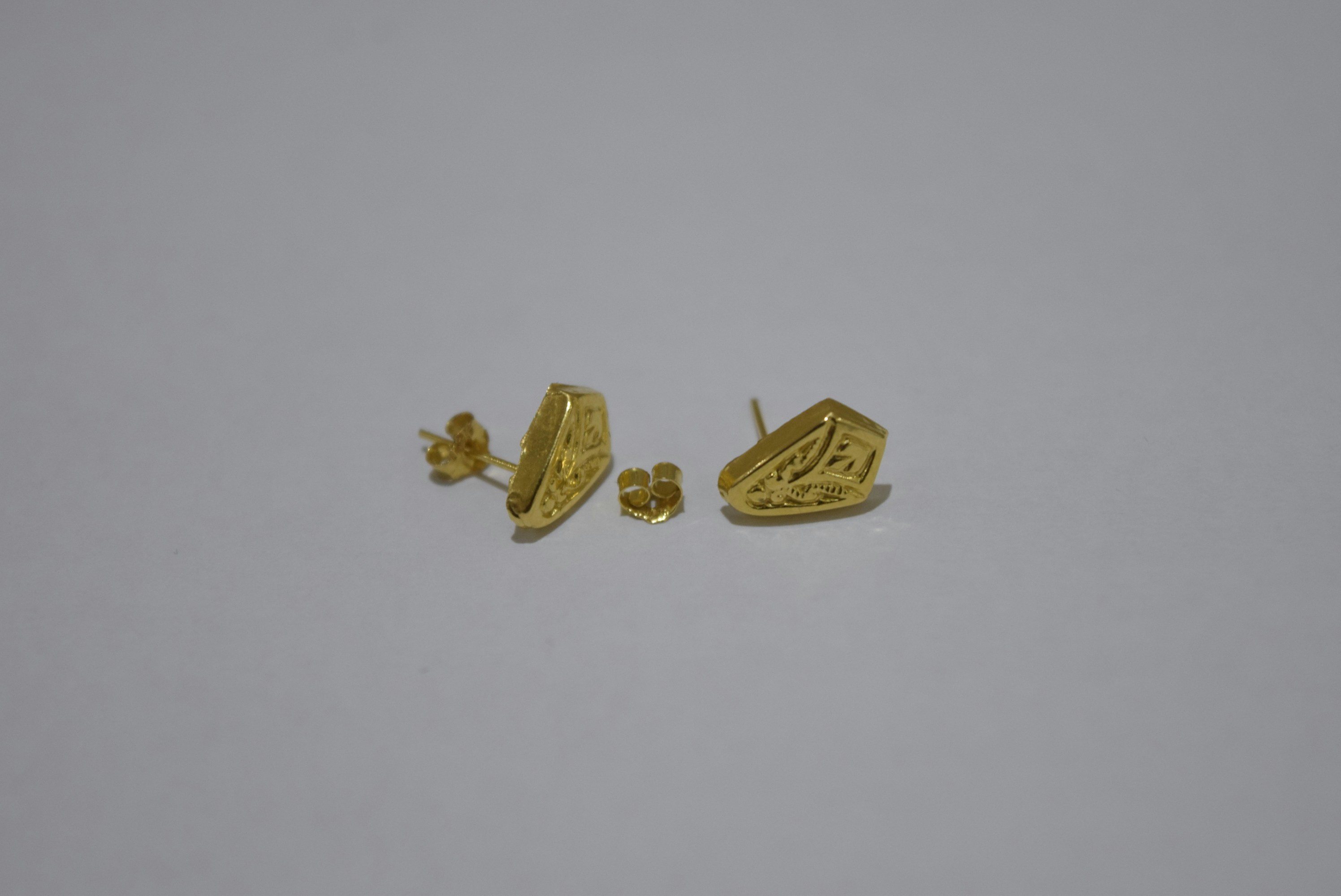 Gold earrings and backs