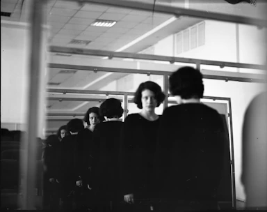 Woman's reflection in a mirror creating a line