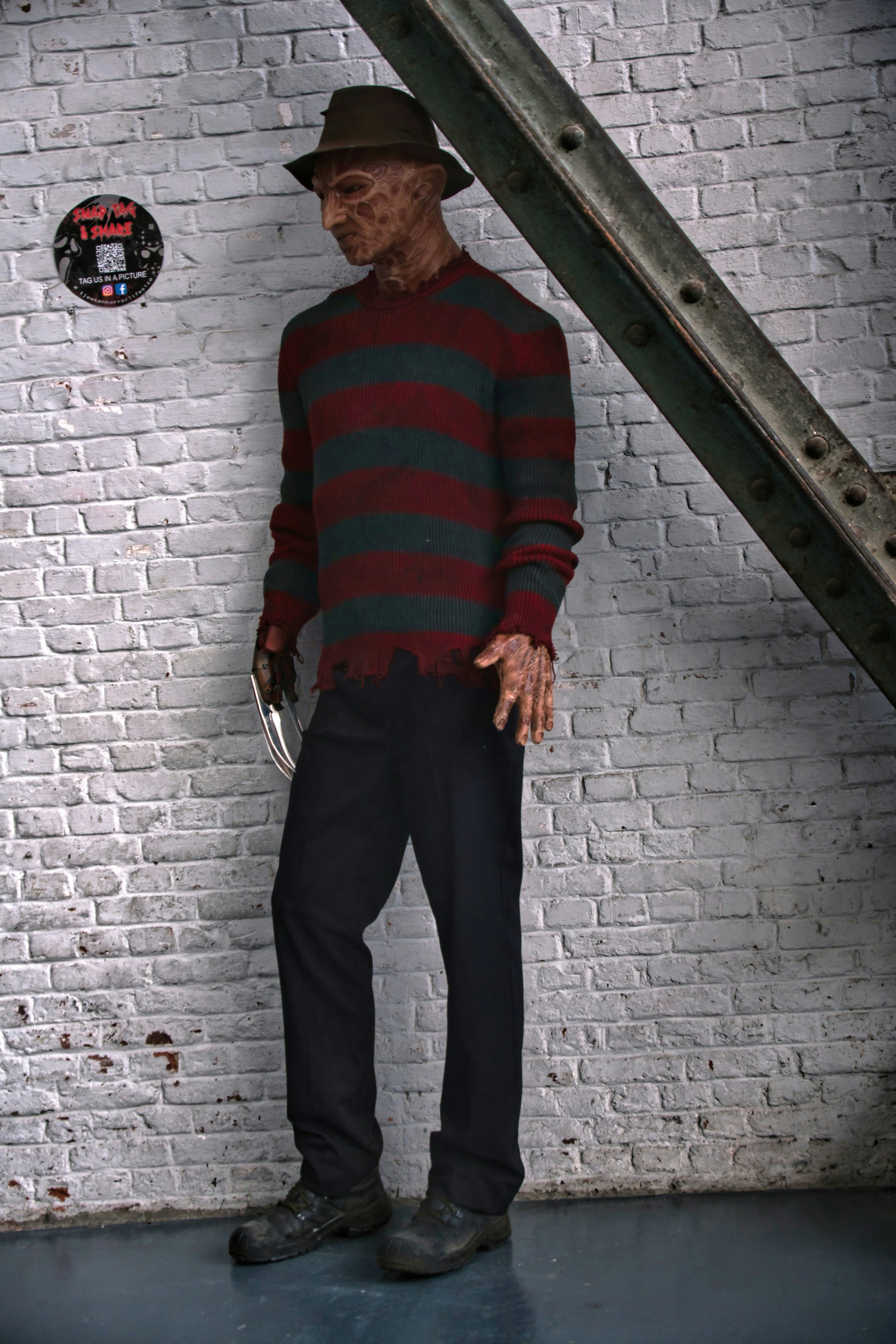 Man in freddy krueger costume with glove