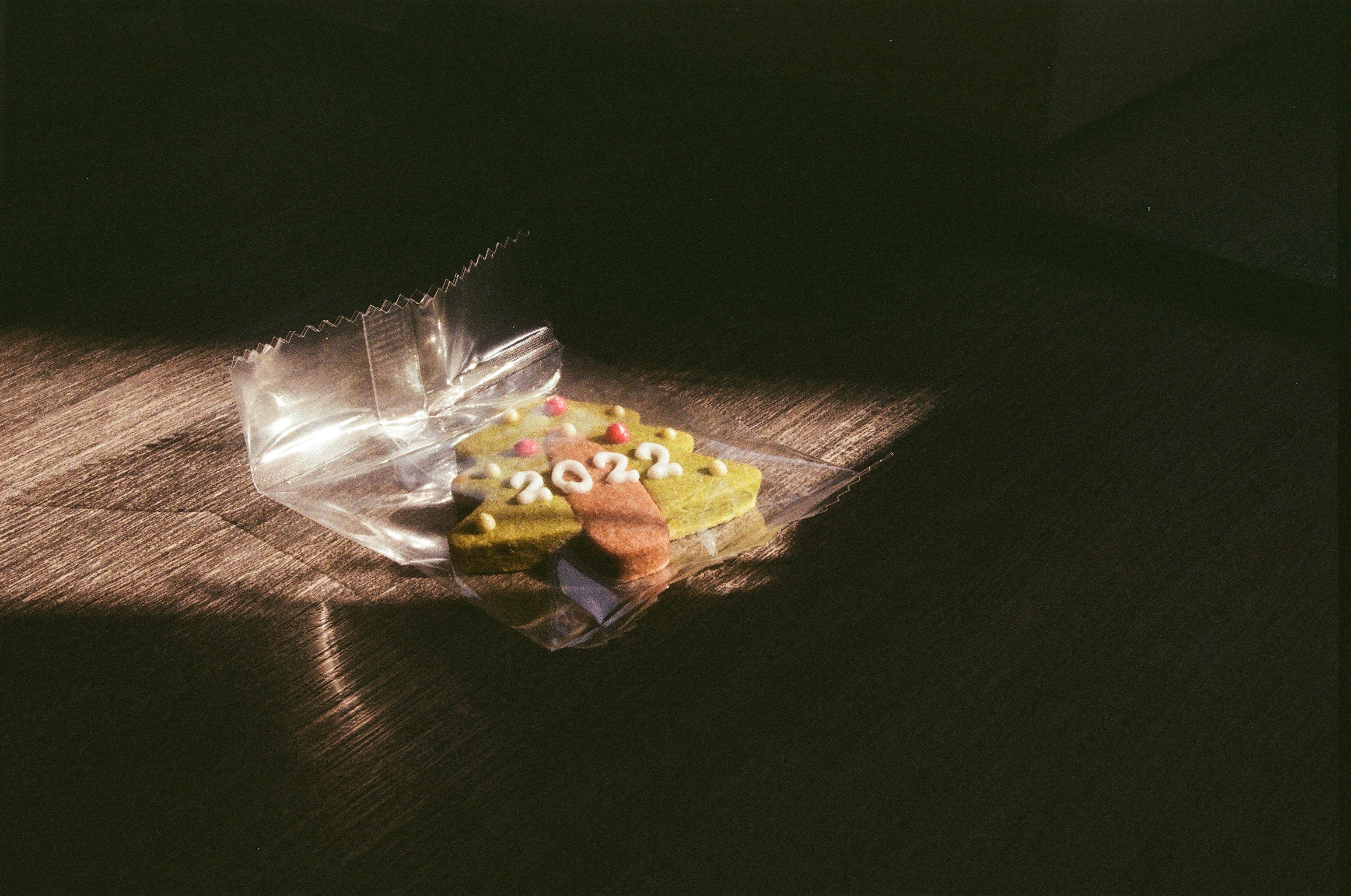 A small cake with '2022' written on it.