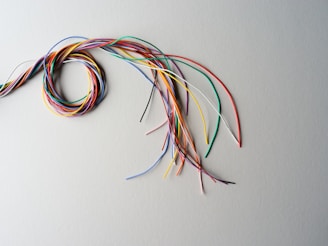 Bundle of colorful wires on a white background