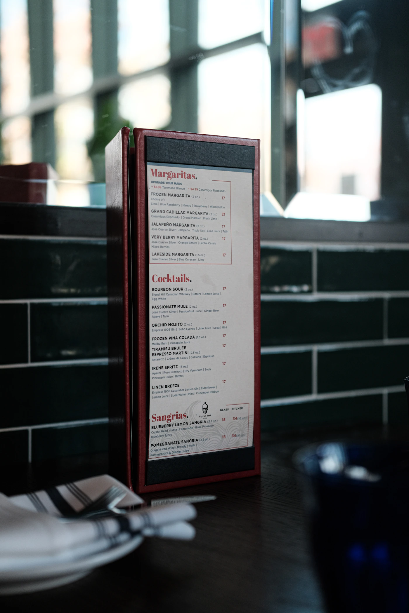 Restaurant menu displayed on a dining table