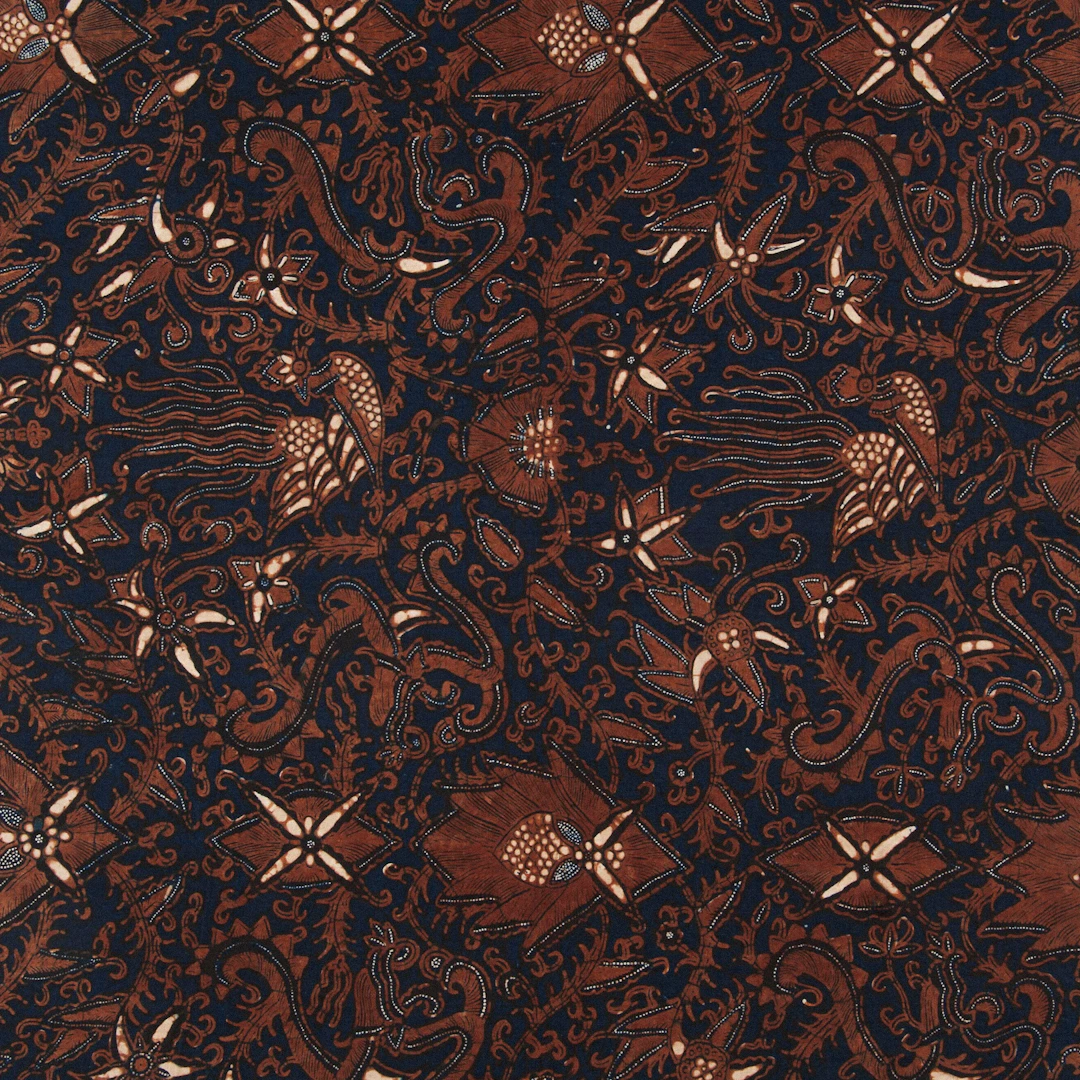 Traditional Indonesian batik fabric with intricate floral and bird patterns