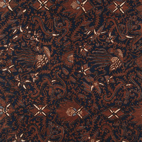 Traditional Indonesian batik fabric with intricate floral and bird patterns