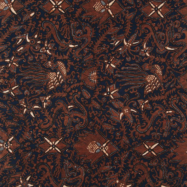 Traditional Indonesian batik fabric with intricate floral and bird patterns