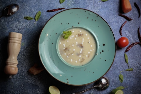 A bowl of creamy soup with tapioca pearls.