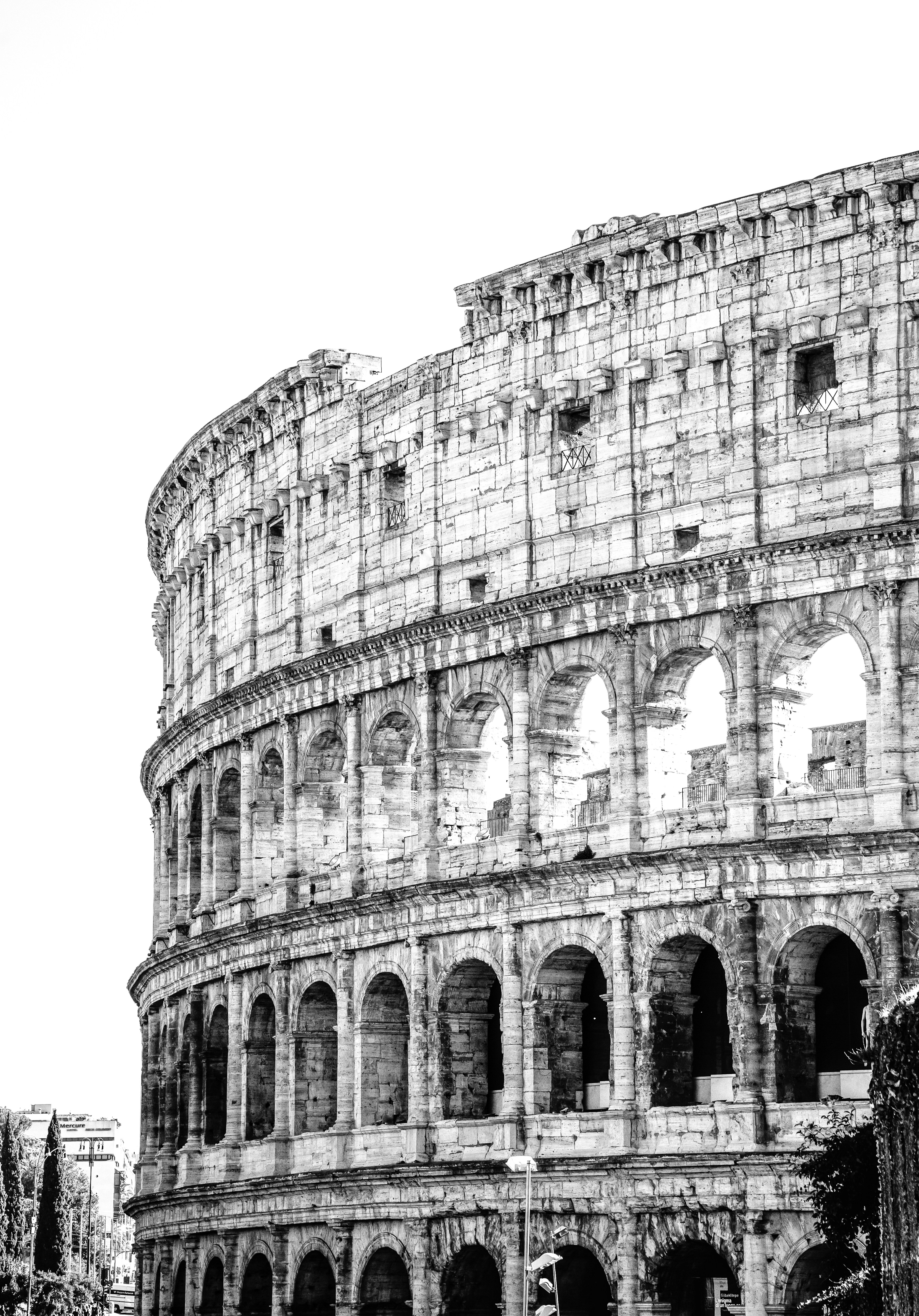 The ancient colosseum in rome, italy, under a bright sky