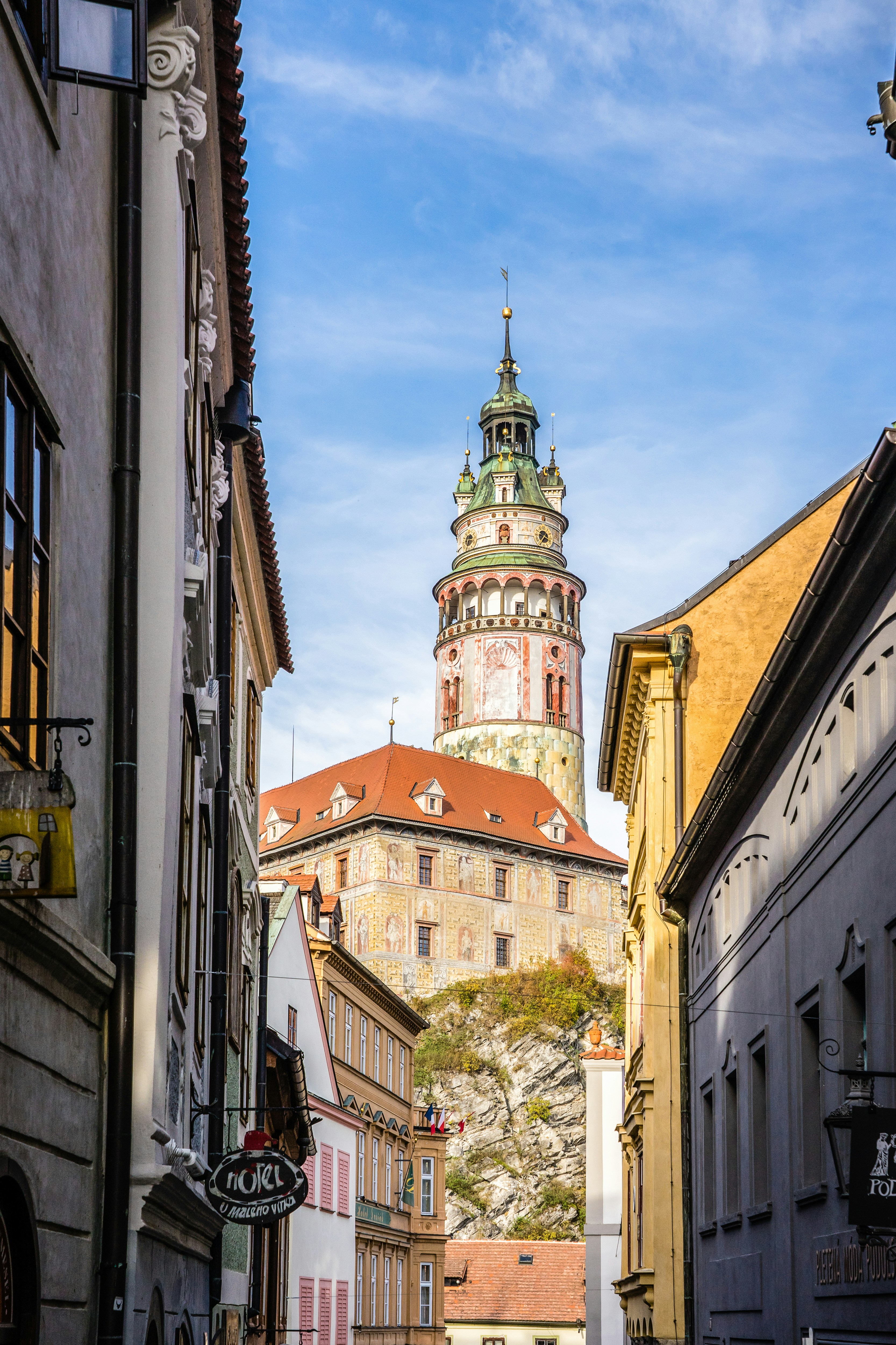 Historic castle tower overlooking a european street.