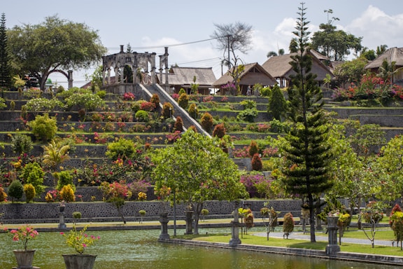 Tiered gardens with stone architecture and vibrant flowers