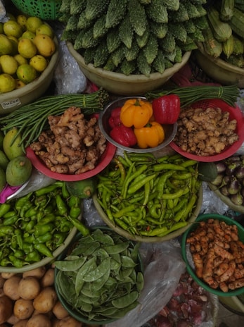 Assortment of fresh vegetables and fruits at a market.