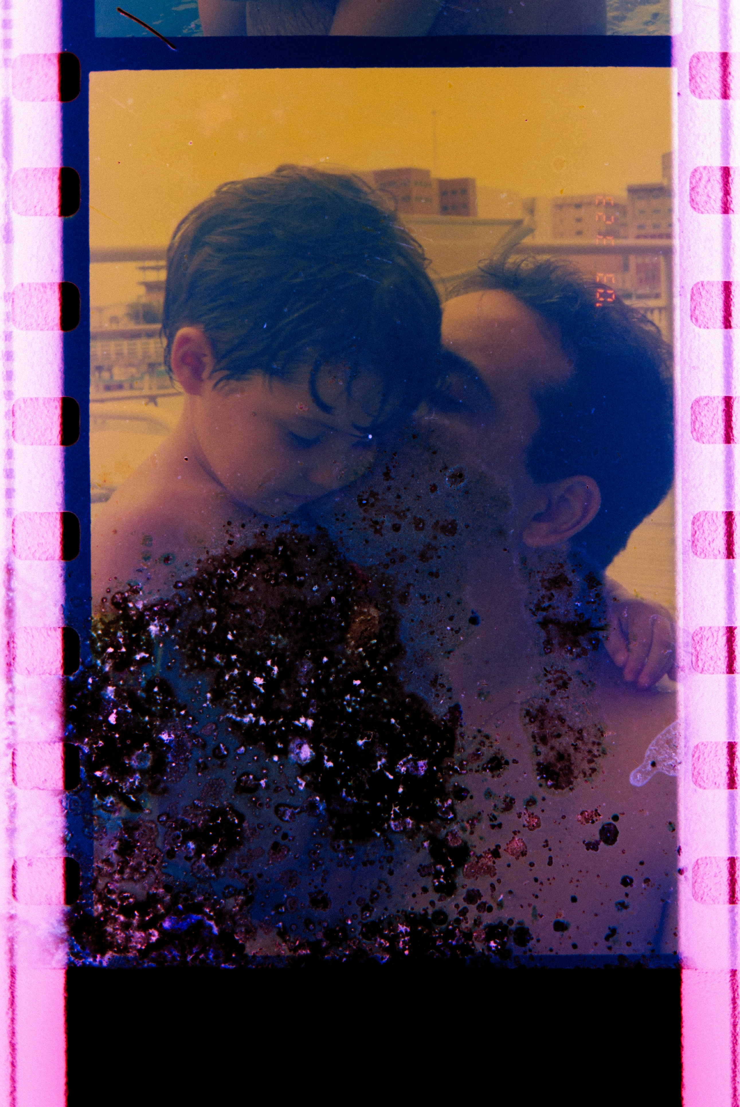 Father and son sharing a tender bonding moment