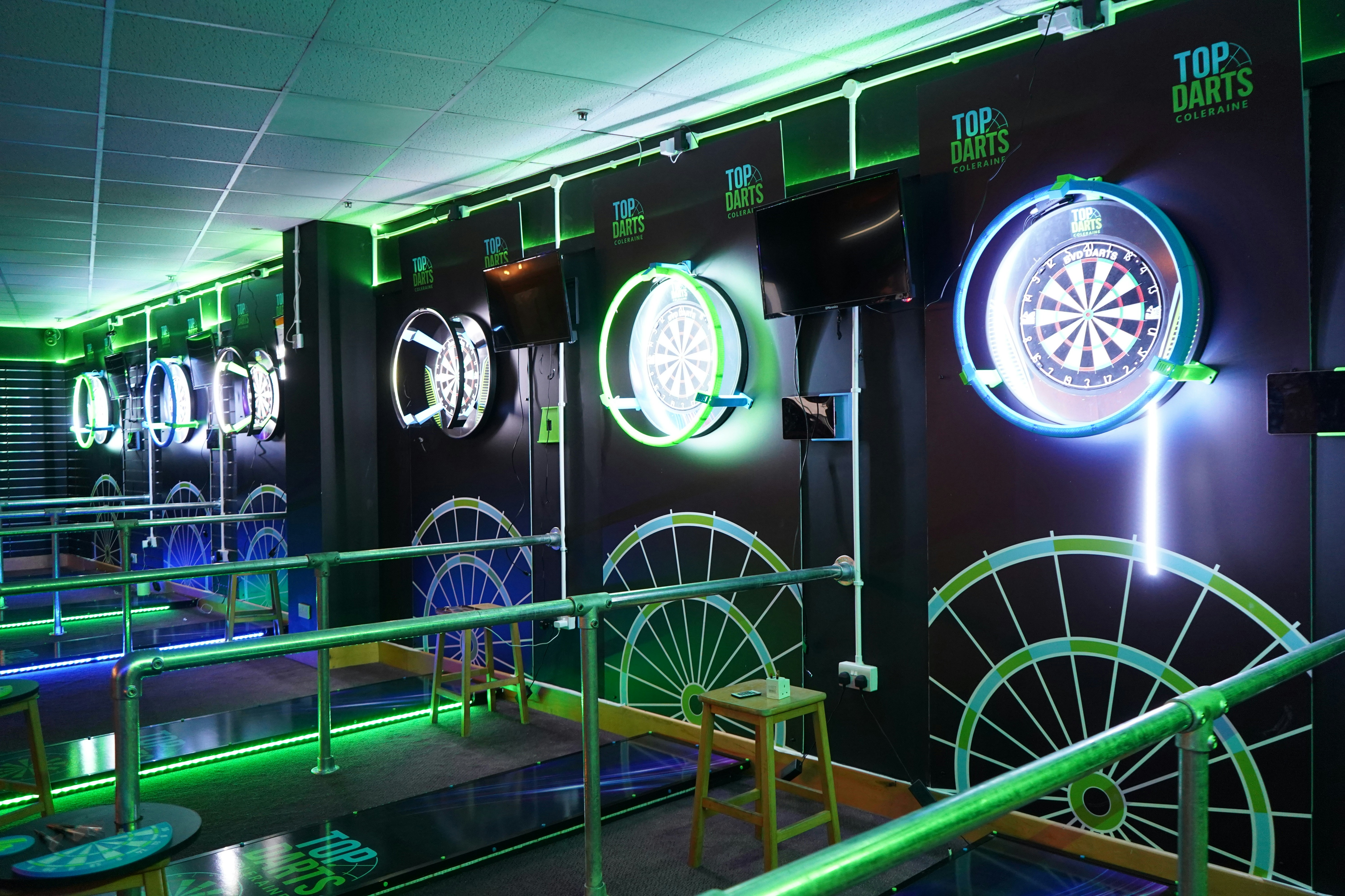 Darts lanes with illuminated boards