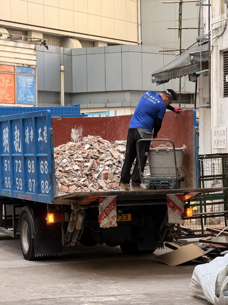 Workers doing junk removal and demolition