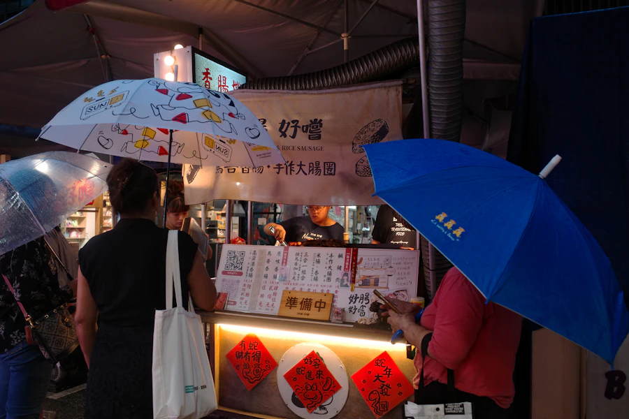 Festival crowd in tropical rain, Southeast Asia