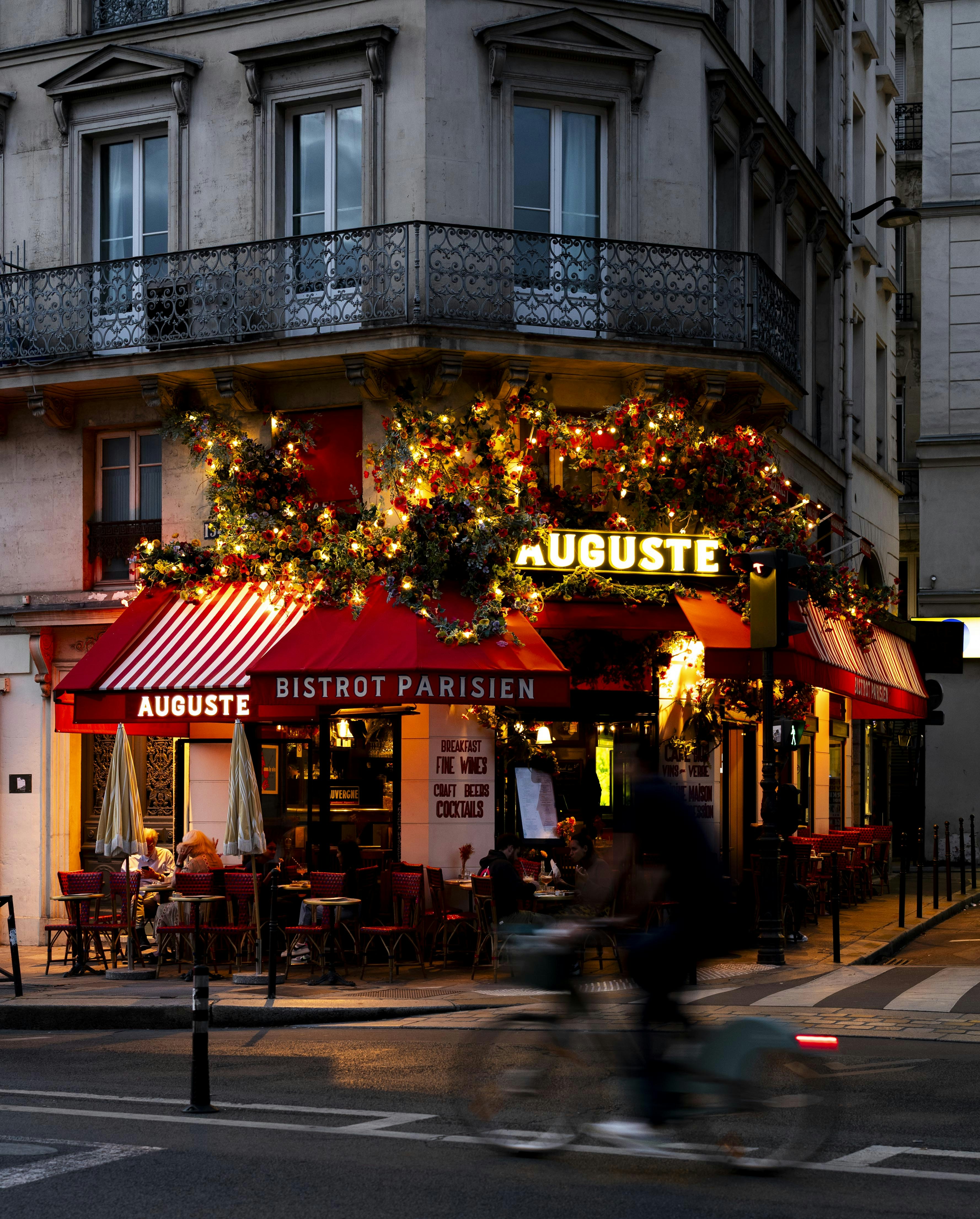 Bistrot parisian with outdoor seating and string lights